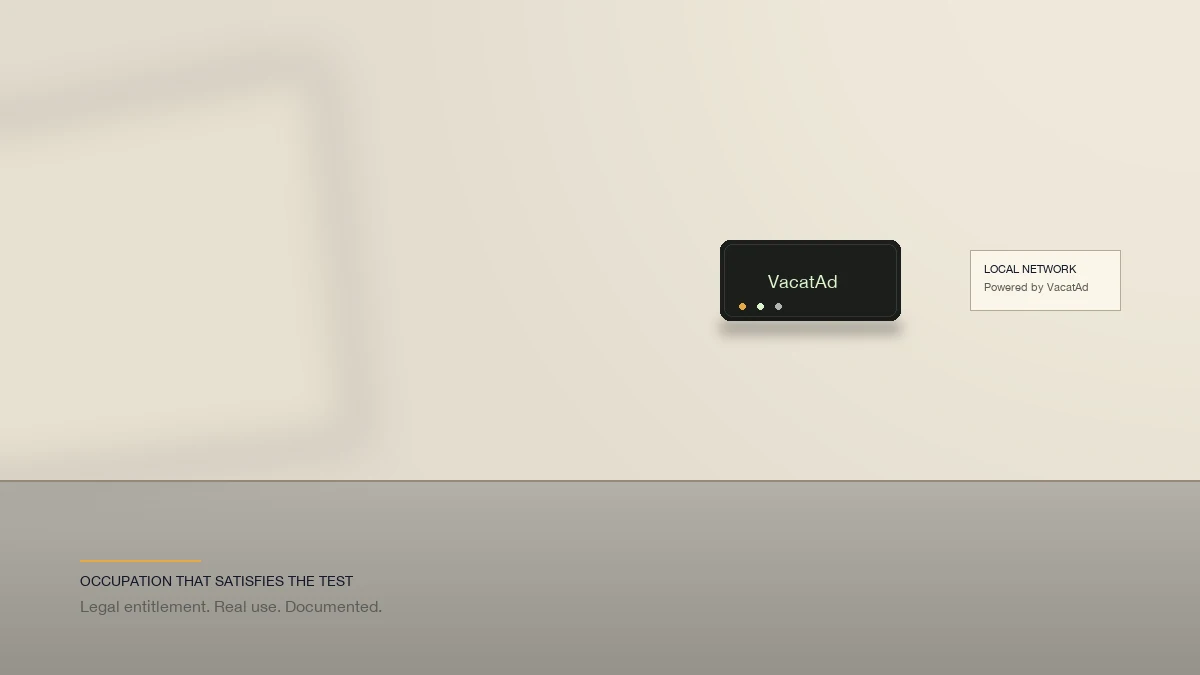 Clean, well-lit commercial interior with a discreet VacatAd WiFi unit on the wall and a small Local Network plaque — space reads as occupied and purposeful rather than staged